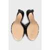Leather mules with figured heels