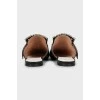 Lacquered mules with decor