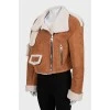 Short sheepskin coat made of eco-leather