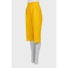Yellow bermuda shorts