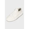 White sneakers with embossed leather