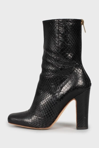 Black snakeskin ankle boots