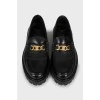 Leather loafers with gold detailing