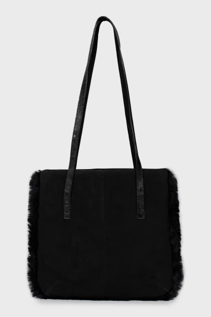 Suede bag decorated with fur