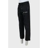 Men's sports trousers with stitched creases
