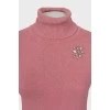 Knitted golf shirt decorated with rhinestones