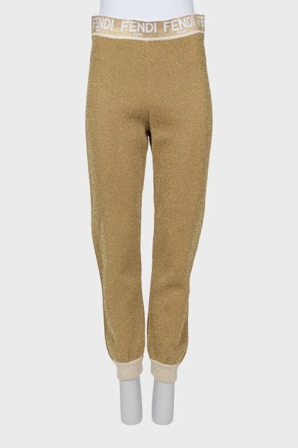 Gold joggers with signature logo
