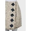 Tweed skirt decorated with flowers