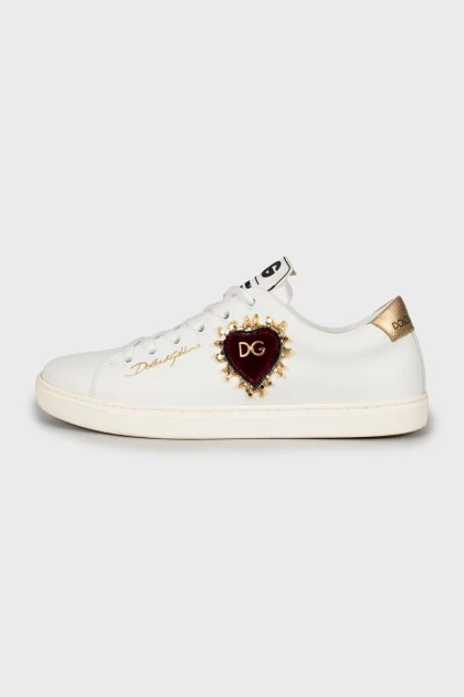 White leather sneakers with patch