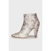 Animal print ankle boots with embossing