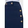 Blue skirt with gold buttons