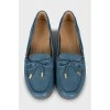 Leather loafers decorated with bow