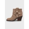 Suede ankle boots with slanted heel