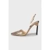 Gold pointed toe shoes