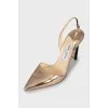 Gold pointed toe shoes