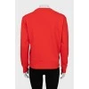 Red sweatshirt with embossed print