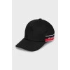 Black cap with brand logo