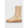 Beige patent leather boots