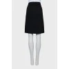 Black pencil skirt with a slit at the back