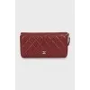 Red wallet with embossed leather