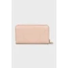Pink leather wallet with tag