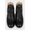Leather boots with embroidered logo