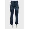 Men's straight-leg jeans with a distressed effect
