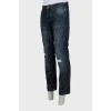 Men's blue jeans with distressed effect