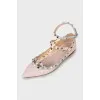 Pointed toe ballerinas decorated with studs
