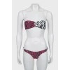 Animal print swimsuit with tag