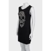 Black dress decorated with chain and rhinestones