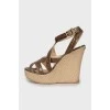 Leather sandals with woven wedge heel