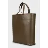 Green shopper bag with tag