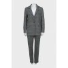 Suit with trousers in checkered print