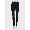 Black leggings with logo and tag