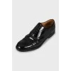 Black patent leather brogues
