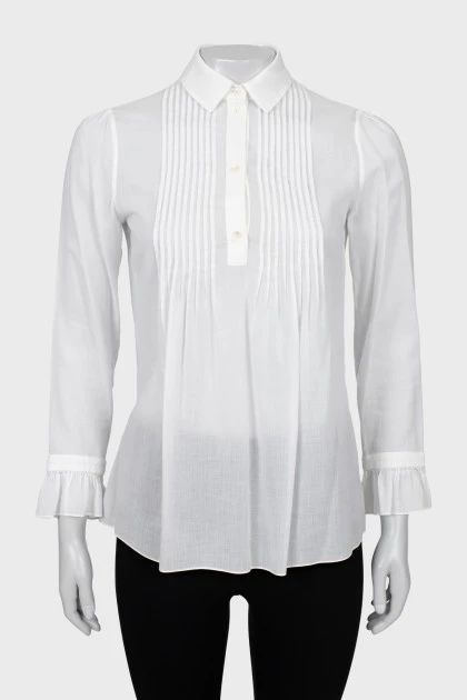 Sheer blouse with ruffled cuffs