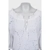 Loose blouse with perforations