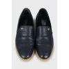Men's blue loafers with perforations