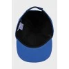 Blue cap with tag