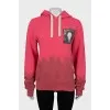 Pink hoodie with logo patch
