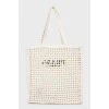 Woven tote bag with brand logo
