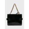Lacquered bag with contrasting stitching
