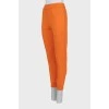 Sports orange joggers with tag