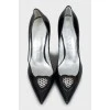 Patent leather shoes with decor and rhinestones