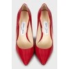 Patent leather shoes with pointed toe