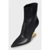 Leather ankle boots with gold heel