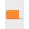 Orange leather wallet with tag