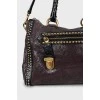 Leather tote bag with metal decor