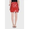 Lacquer skirt with bow